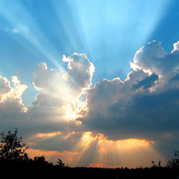 Sunburst with Rays through the Clouds
